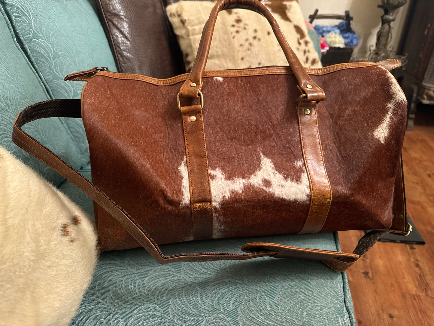 cow hide duffle bag