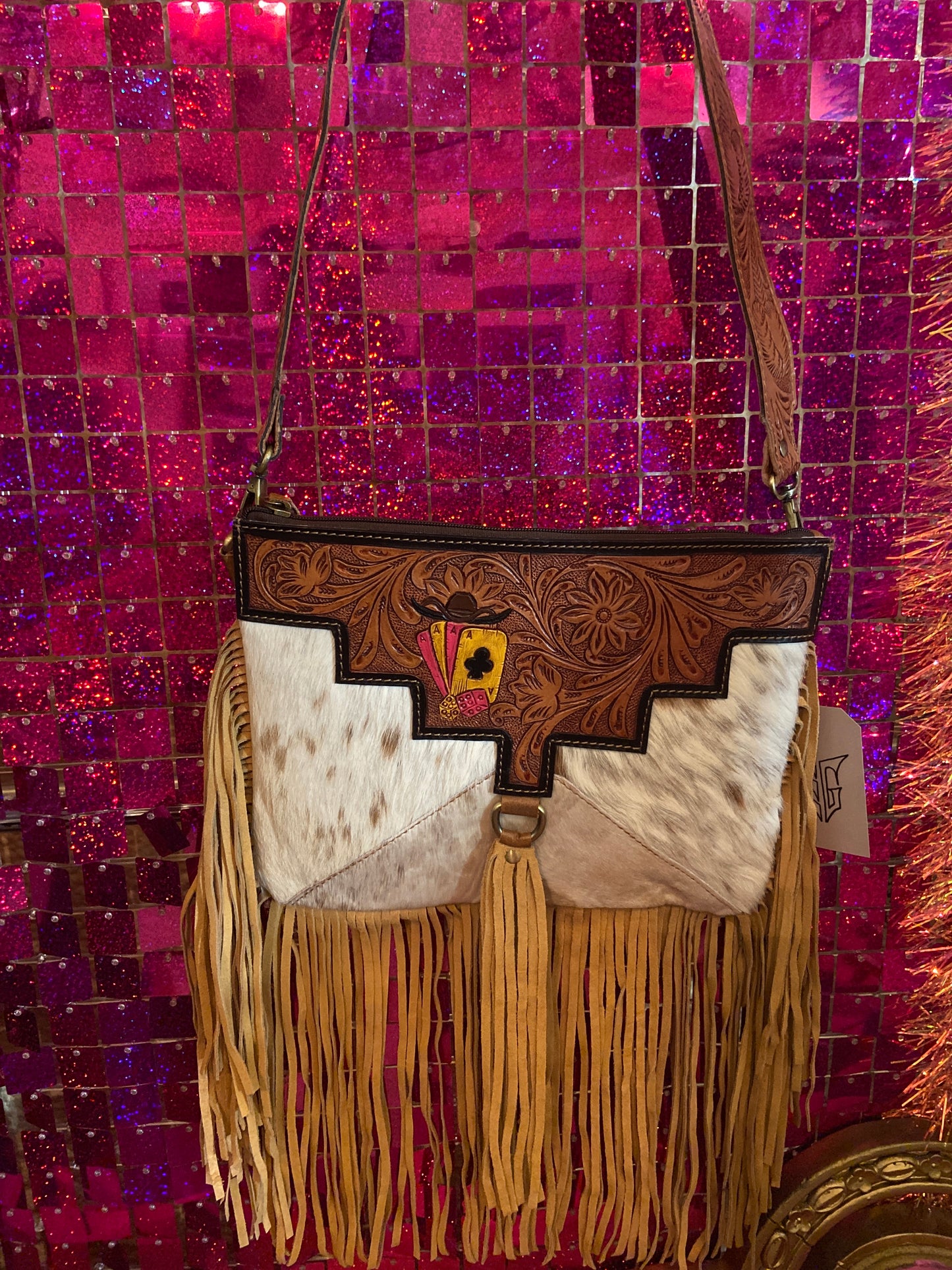 Tool fringe hide crossbody