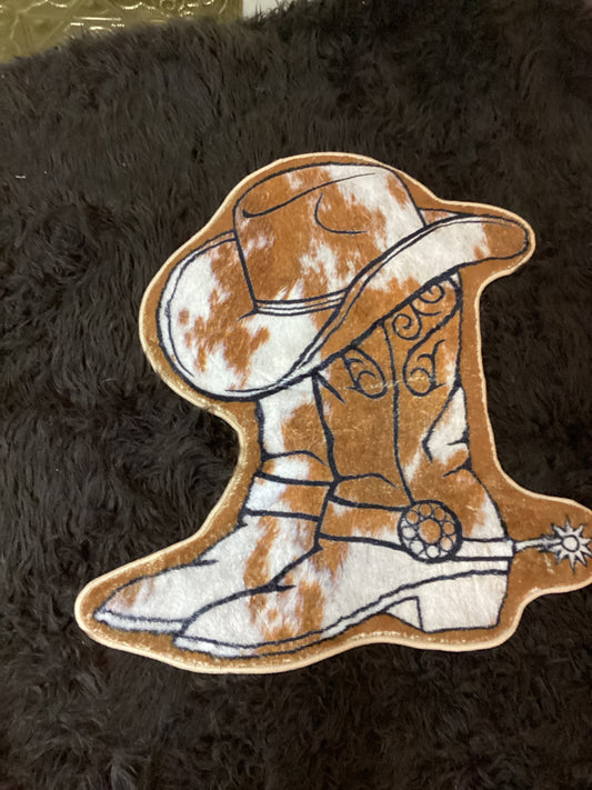 Brown cowboy boot rug